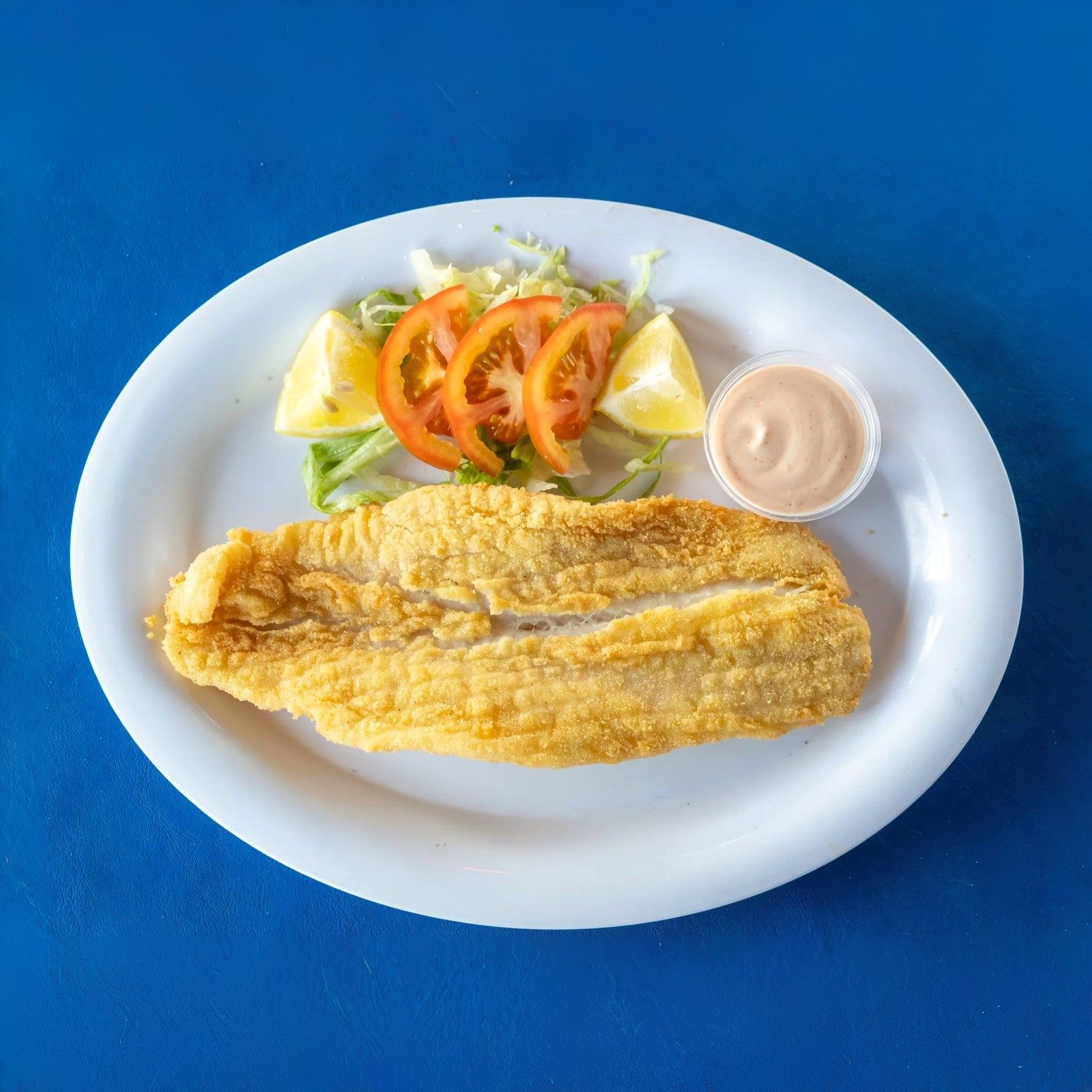 Pescado Milanesa.
